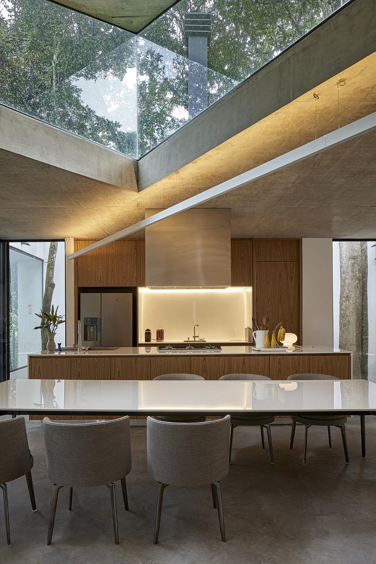 TETRO Arquitetura built zig-zag floating house raised on steel pillars in a lush Brazilian forest