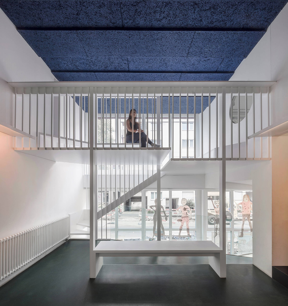 FOCKETYN DEL RIO Studio transforms an unused corridor of a building into a community center in Basel