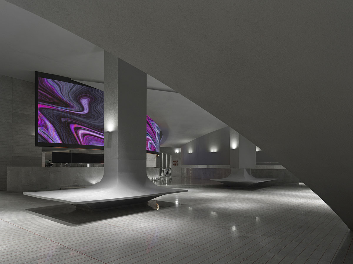 Greyscale interior provides acoustically comfortable space for a cinema by One Plus Partnership