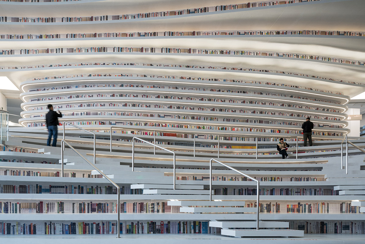 MVRDV’s topographical Tianjin Binhai Public Library featuring millions of books opens in China