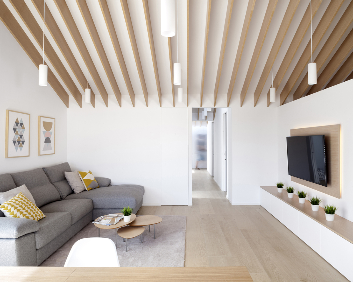 Pablo Muñoz Payá Arquitectos renovates former house with wooden shutters in Spain