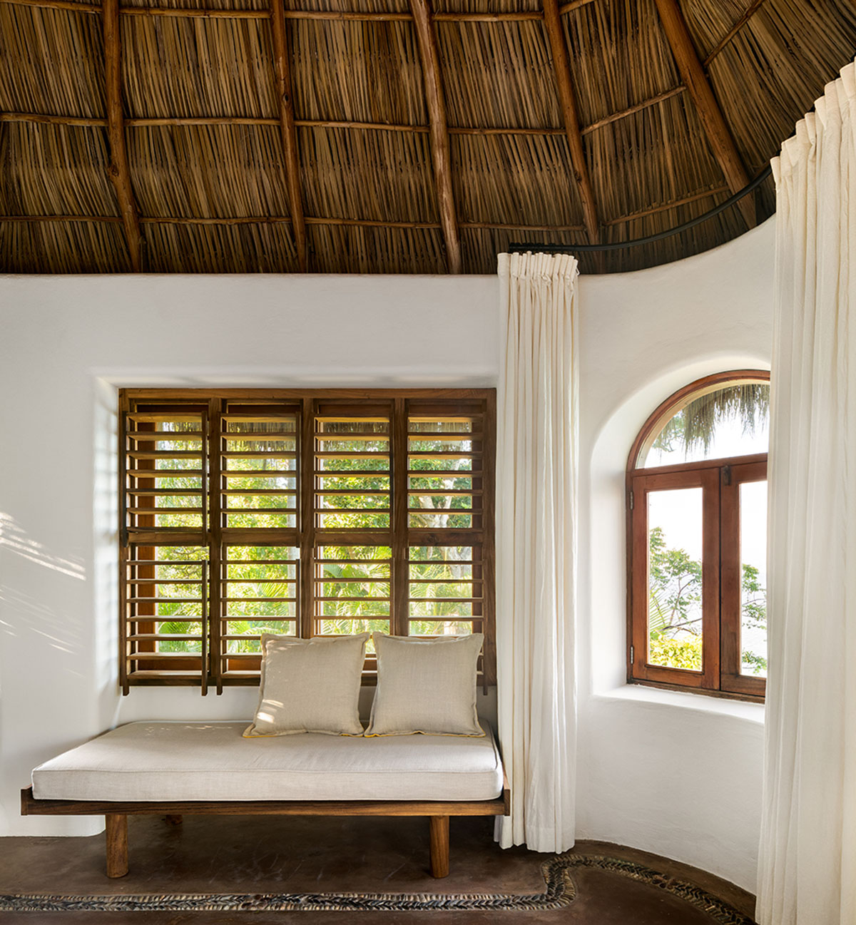 MAIN OFFICE adds half-circle yoga platform to thatched-roof guest villas in Sayulita, Mexico