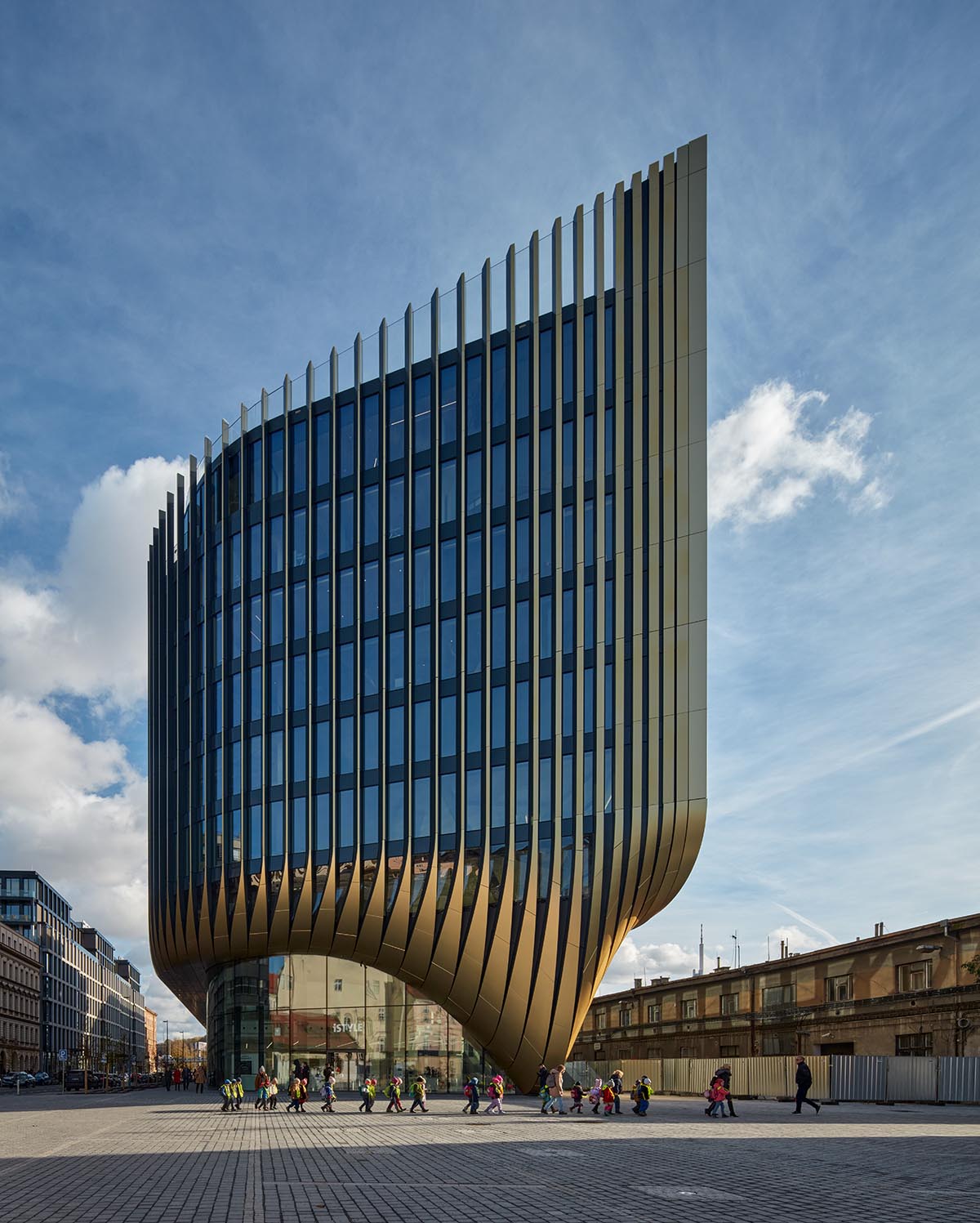 Zaha Hadid Architects completes Masaryčka building with golden vertical fins in Prague