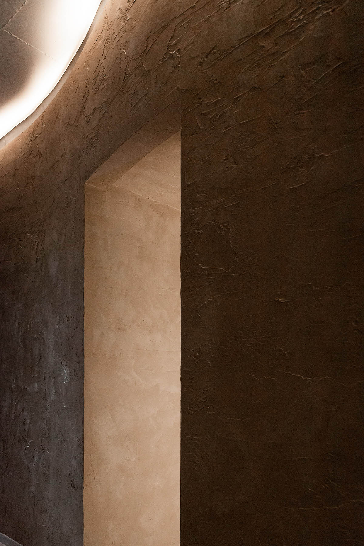 Splinter Society transforms former chocolate factory warehouse flat with earthy and rustic tones