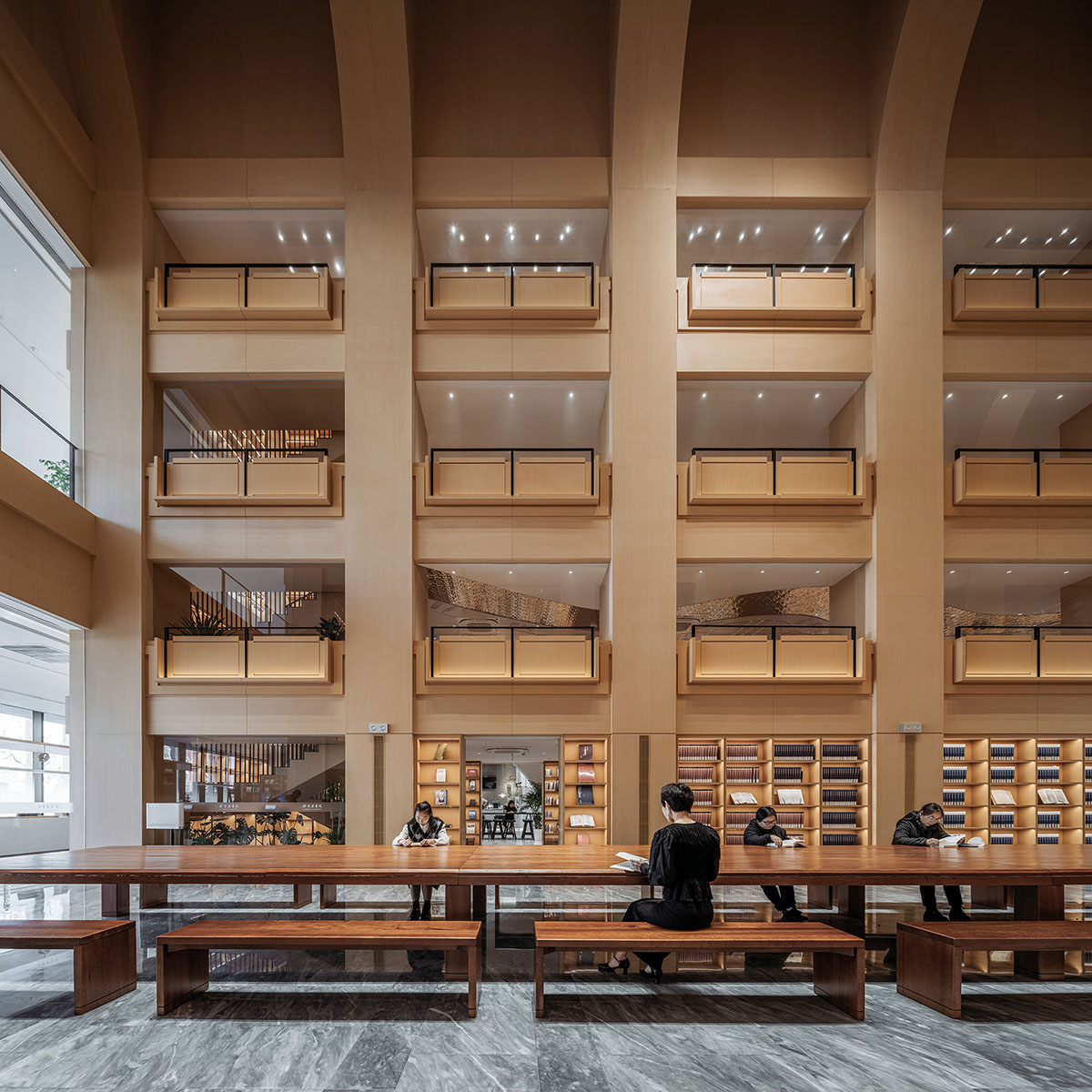 Zikawei Library features a spacious atrium with deep alcoves inspired by Chinese trousseau box