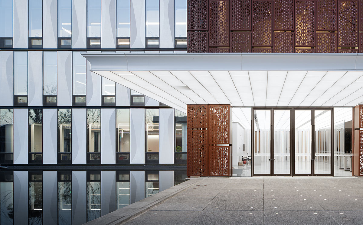 UAD completes office complex with perforated aluminum facade in Zhejiang