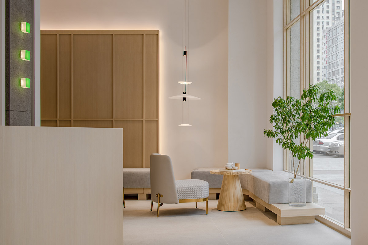 JACKY.W DESIGN completes dental clinic with rounded wooden walls and natural tones in China 