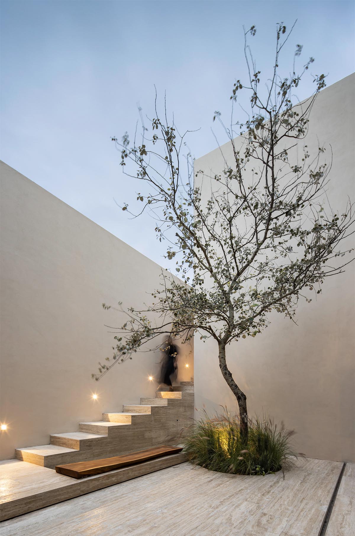 Sabino 10 residence by Editorial features a solid façade with hermetic volumes in Mexico