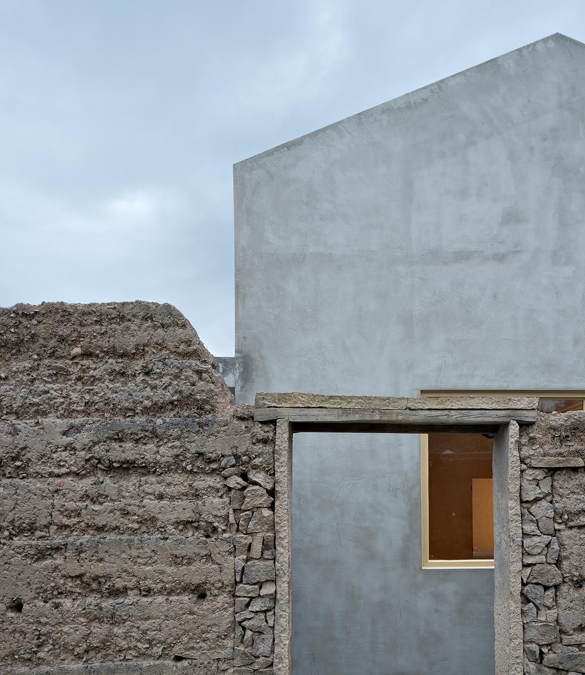 UAD converts old folk houses into new Villagers' Home that naturally grows out of the old walls