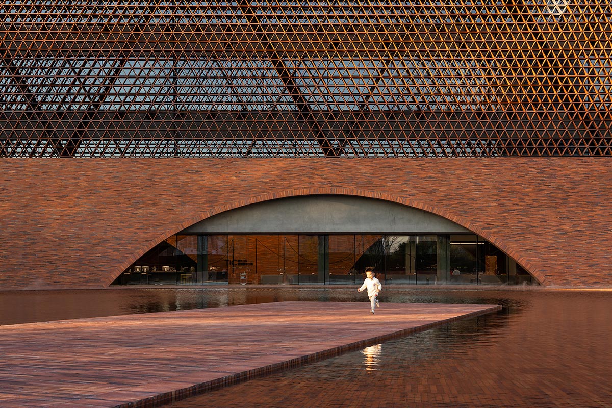 DOMANI completes TIC Art Center with red ceramic brick in Foshan 