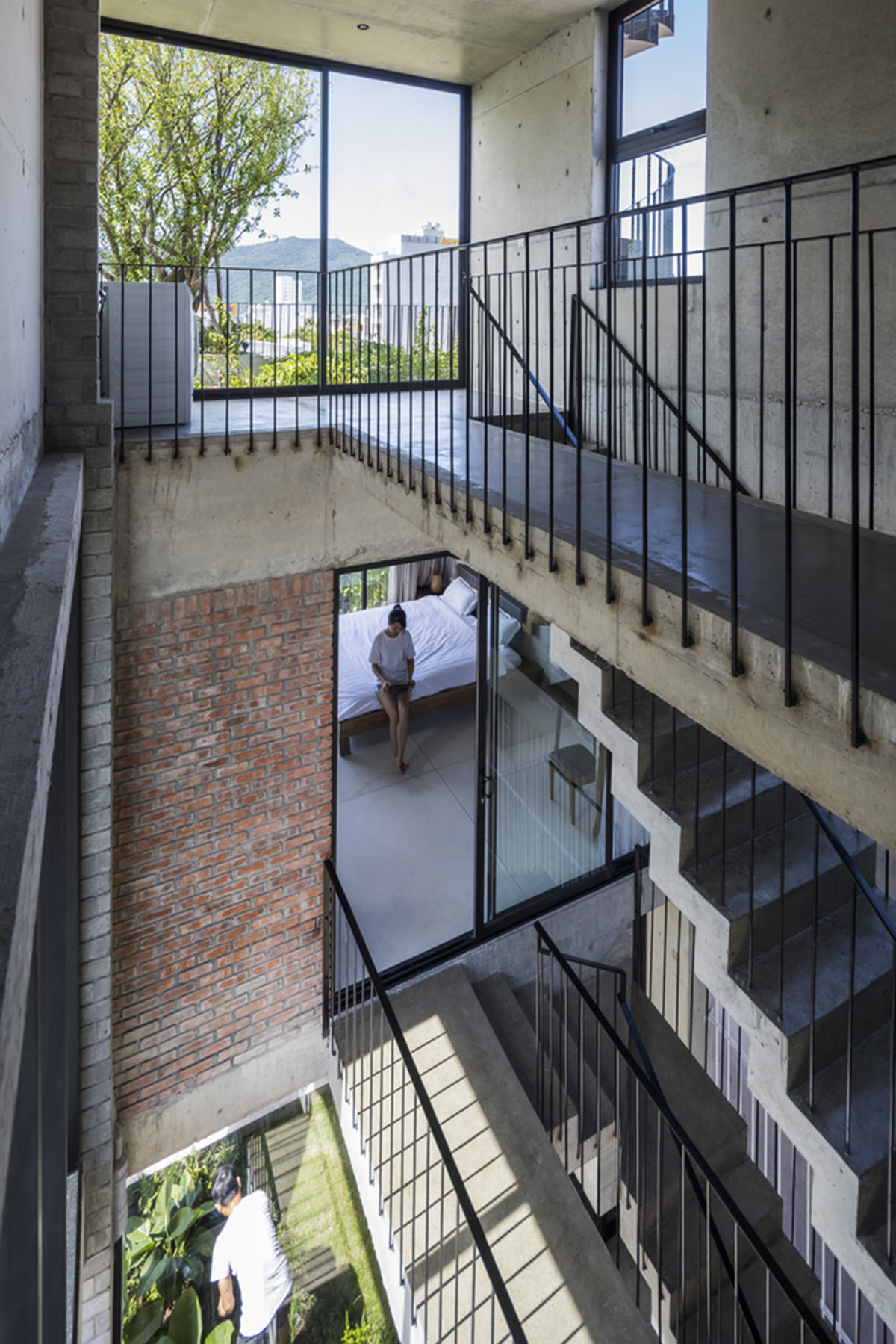 Ho Khue Architects' concrete house is inspired by imaginations of children’s LEGO game in Vietnam