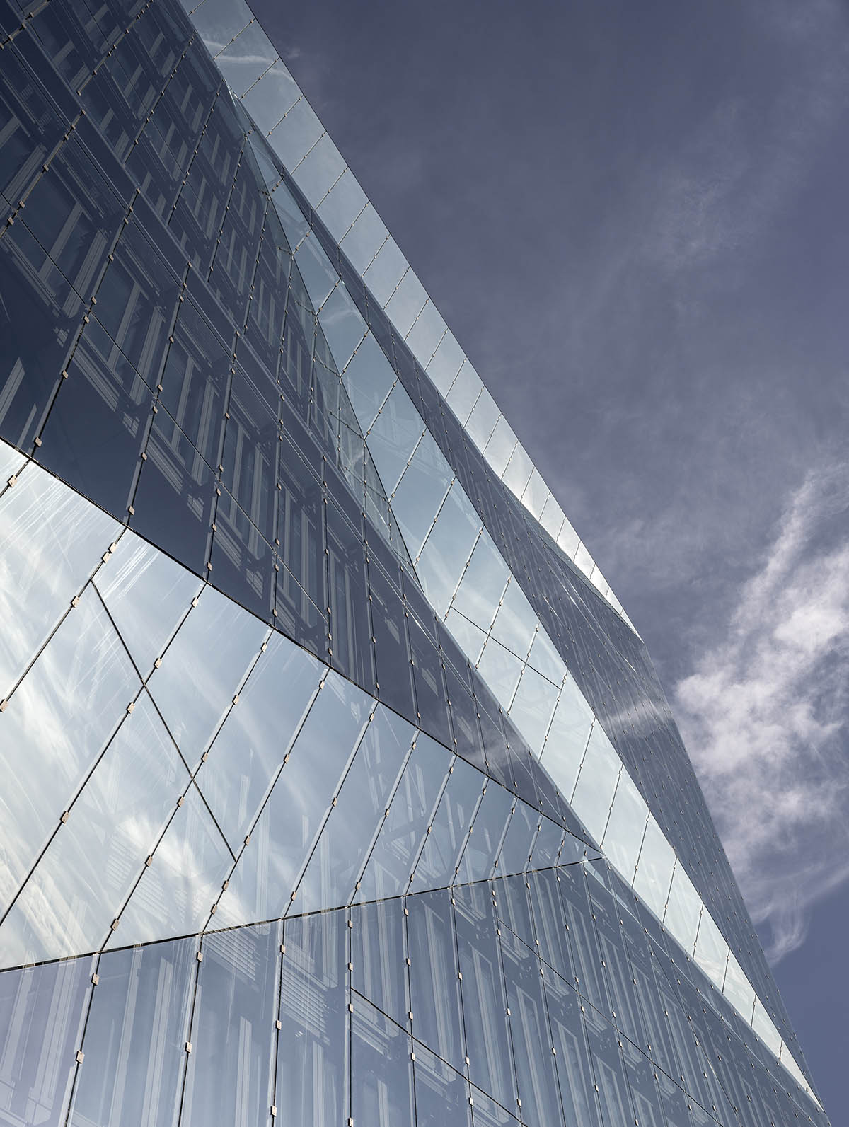 3XN's sculptural and fully glazed smart office building opens in Berlin