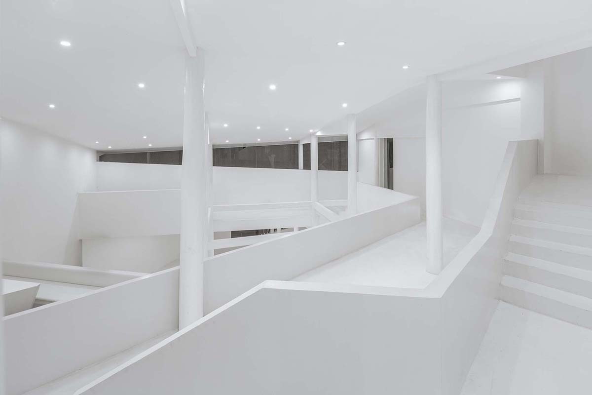 STUDIO QI reinterprets sequence of living conditions with tilted hotel on a hilly plot in China