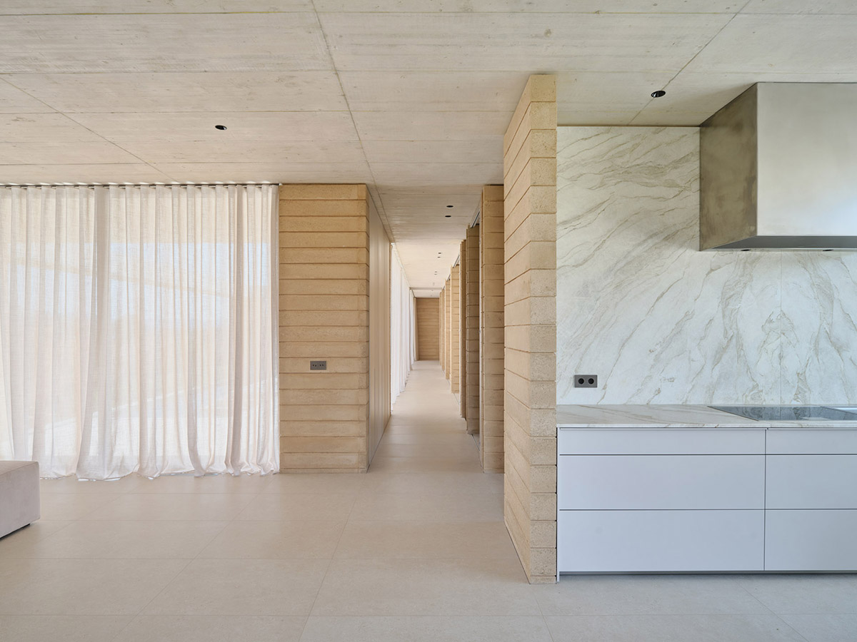 Atheleia Arquitectura completes Casa Artiga with rammed earth walls in Barcelona 