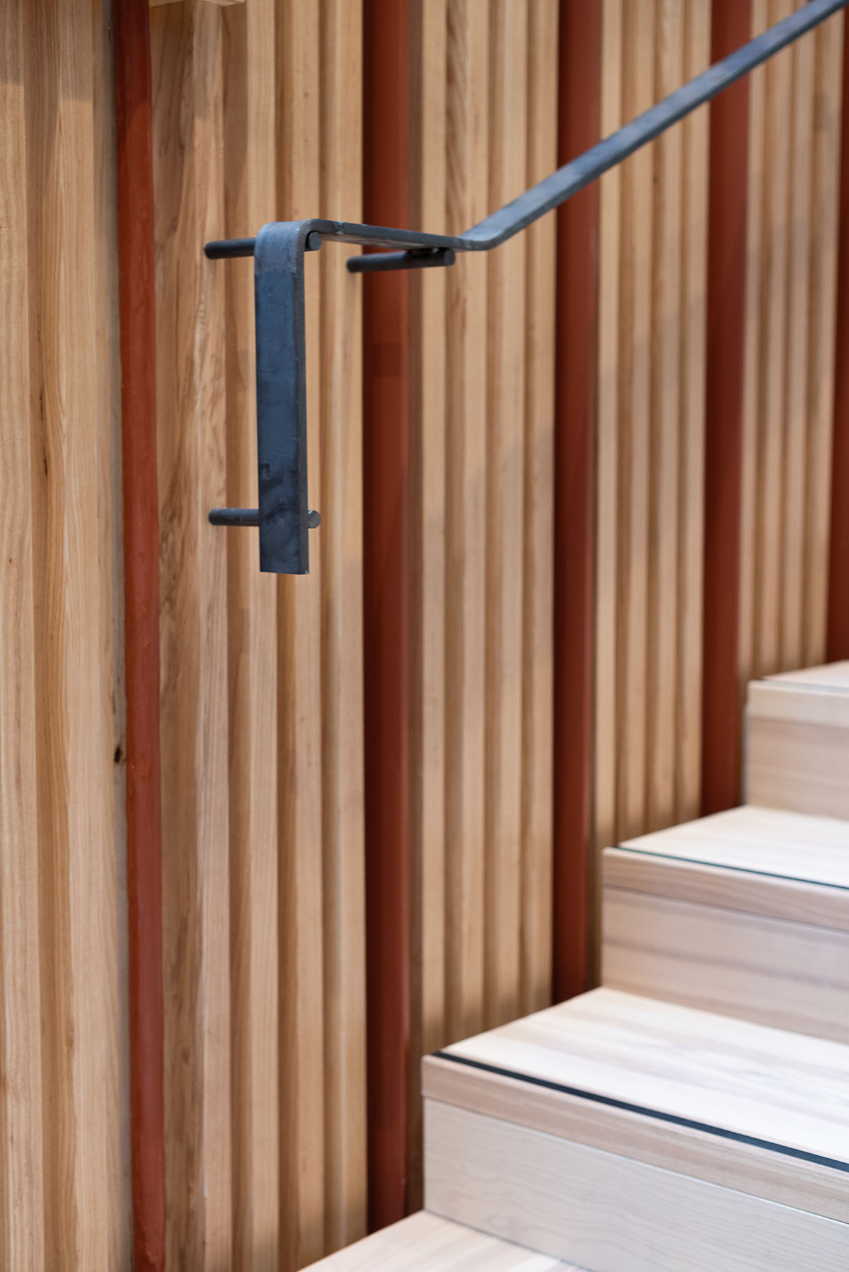 Atelier Oslo and KIMA Arkitektur restore former warehouse as a press house with light-lit atrium