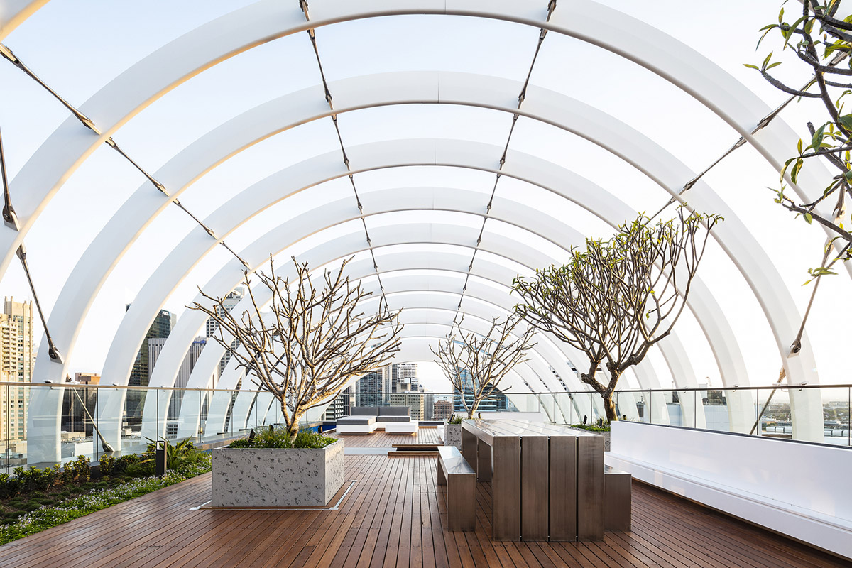 Koichi Takada Architects creates a sculpted form made of hand-brick material for new tower in Sydney