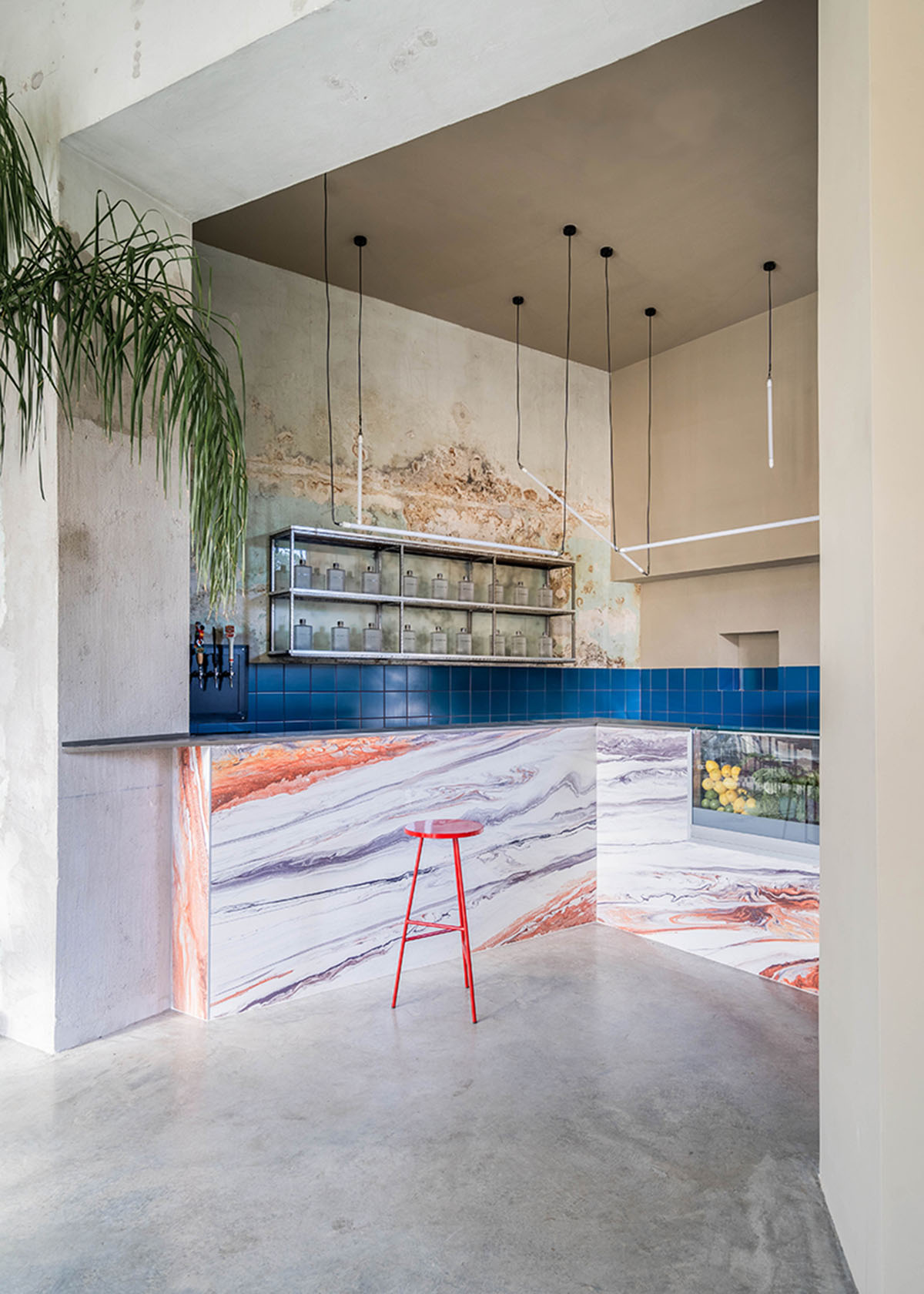 STUDIOTAMAT converts abandoned bakery into a colorful restaurant in Rome