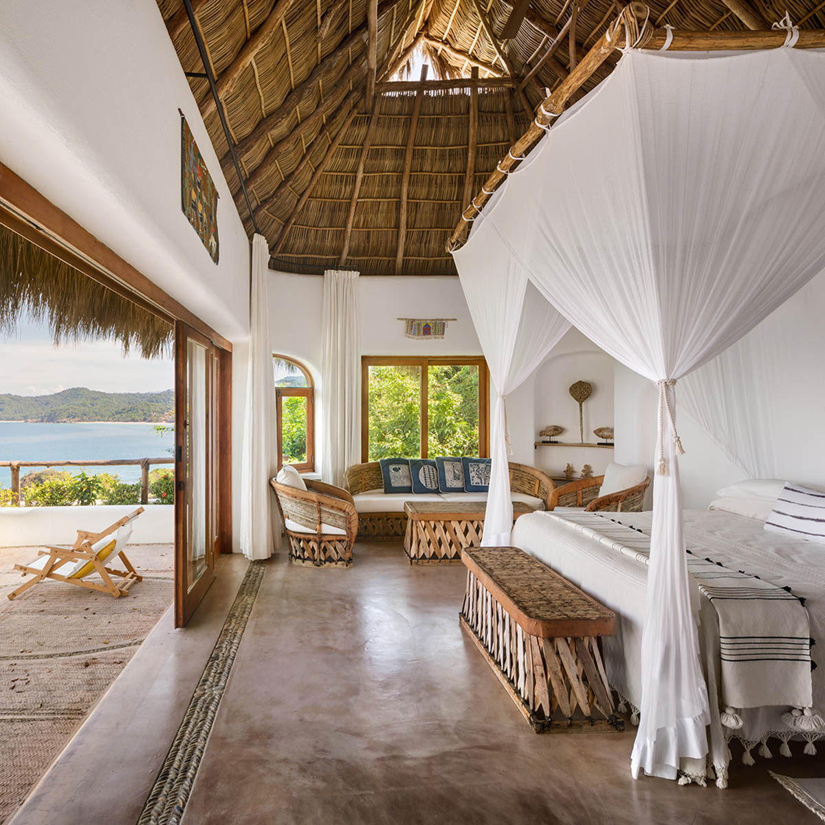 MAIN OFFICE adds half-circle yoga platform to thatched-roof guest villas in Sayulita, Mexico