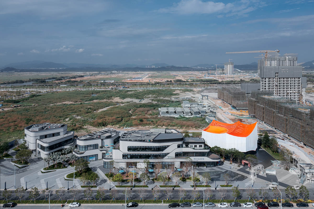 Wutopia Lab built showroom evoking Chinese red mountains with dazzling orange-colored roof