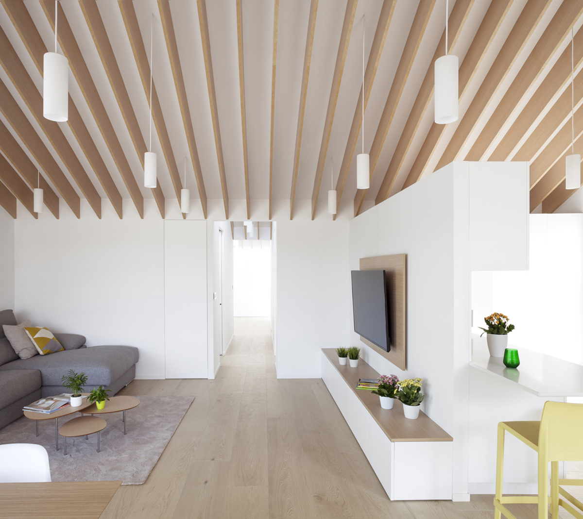 Pablo Muñoz Payá Arquitectos renovates former house with wooden shutters in Spain