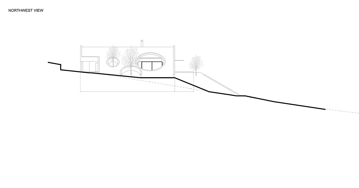 Curved green roof hides winery by Aleš Fiala in a rolling landscape in the Czech Republic