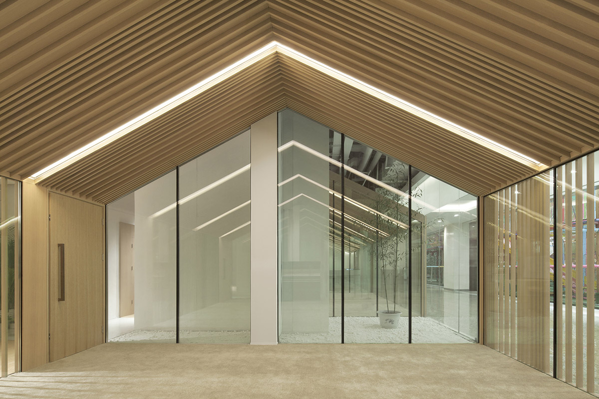 ARCHSTUDIO&rsquo;s new Children Education Institution features bamboo strips and white library wall