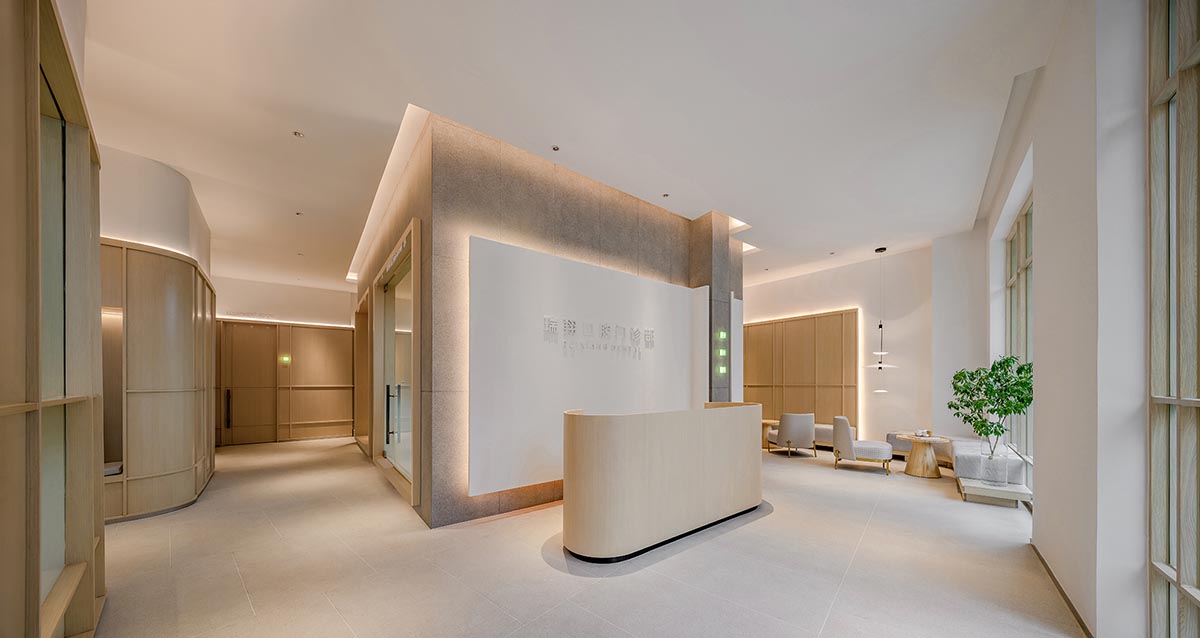 JACKY.W DESIGN completes dental clinic with rounded wooden walls and natural tones in China 
