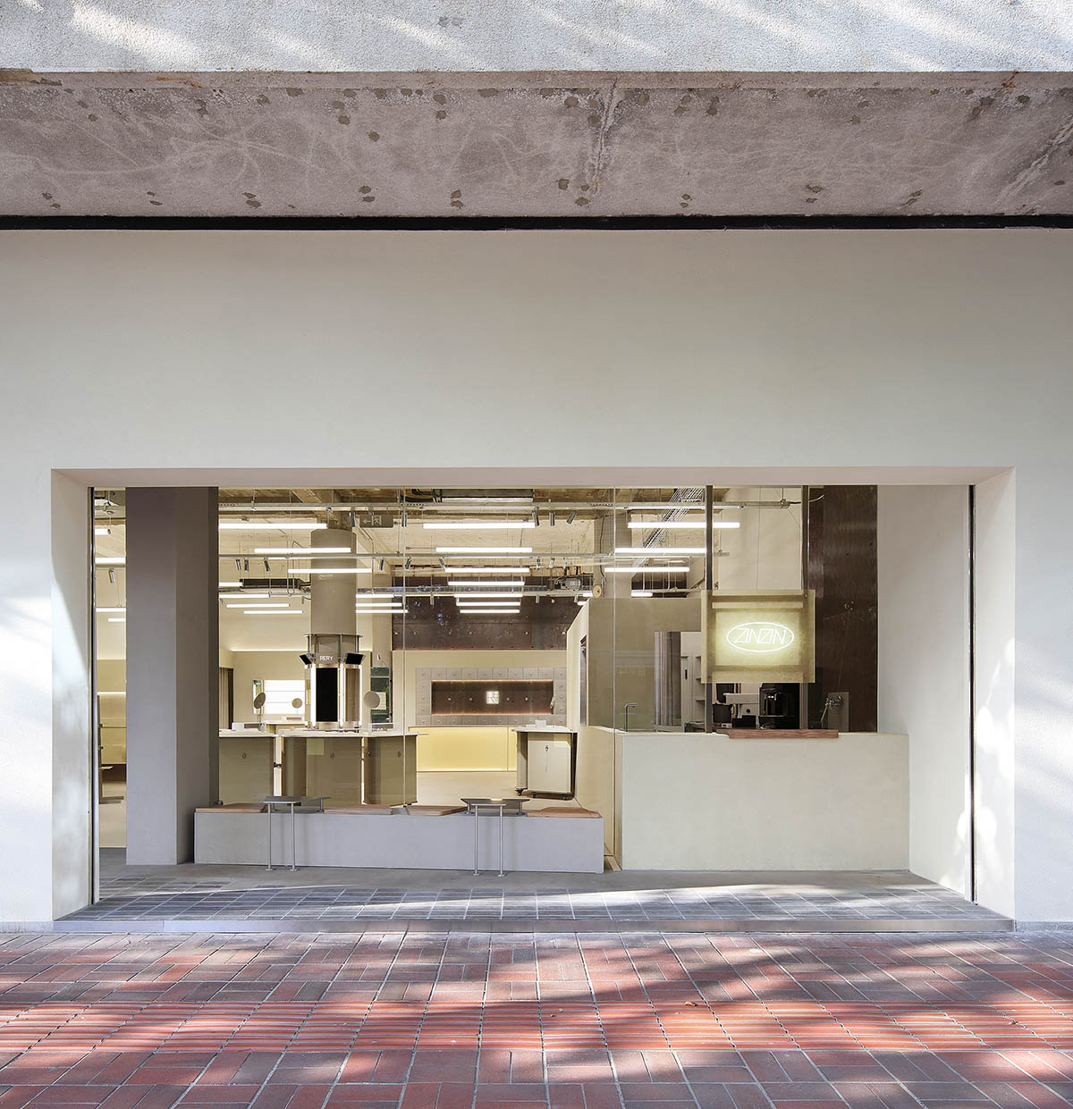 Dayuan Design Studio blends coffee culture and beauty retail with modular, adaptable metal displays