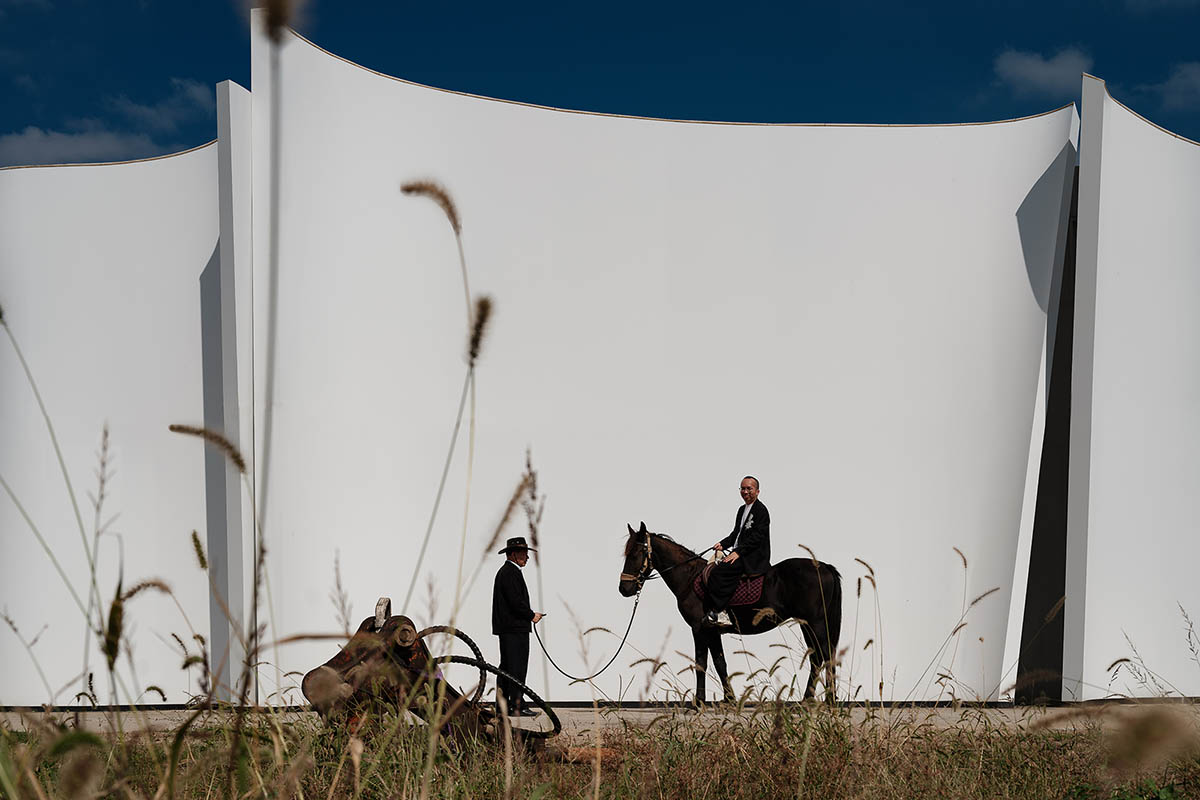 Chinese chapel creates a fluid silhouette featuring curving walls to mimic blossoming petals 