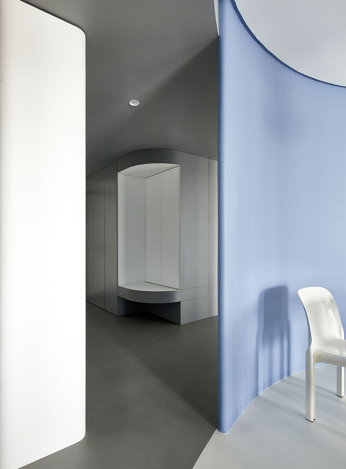 XIGO STUDIO creates gray and blue-colored interiors for apartment in Beijing 