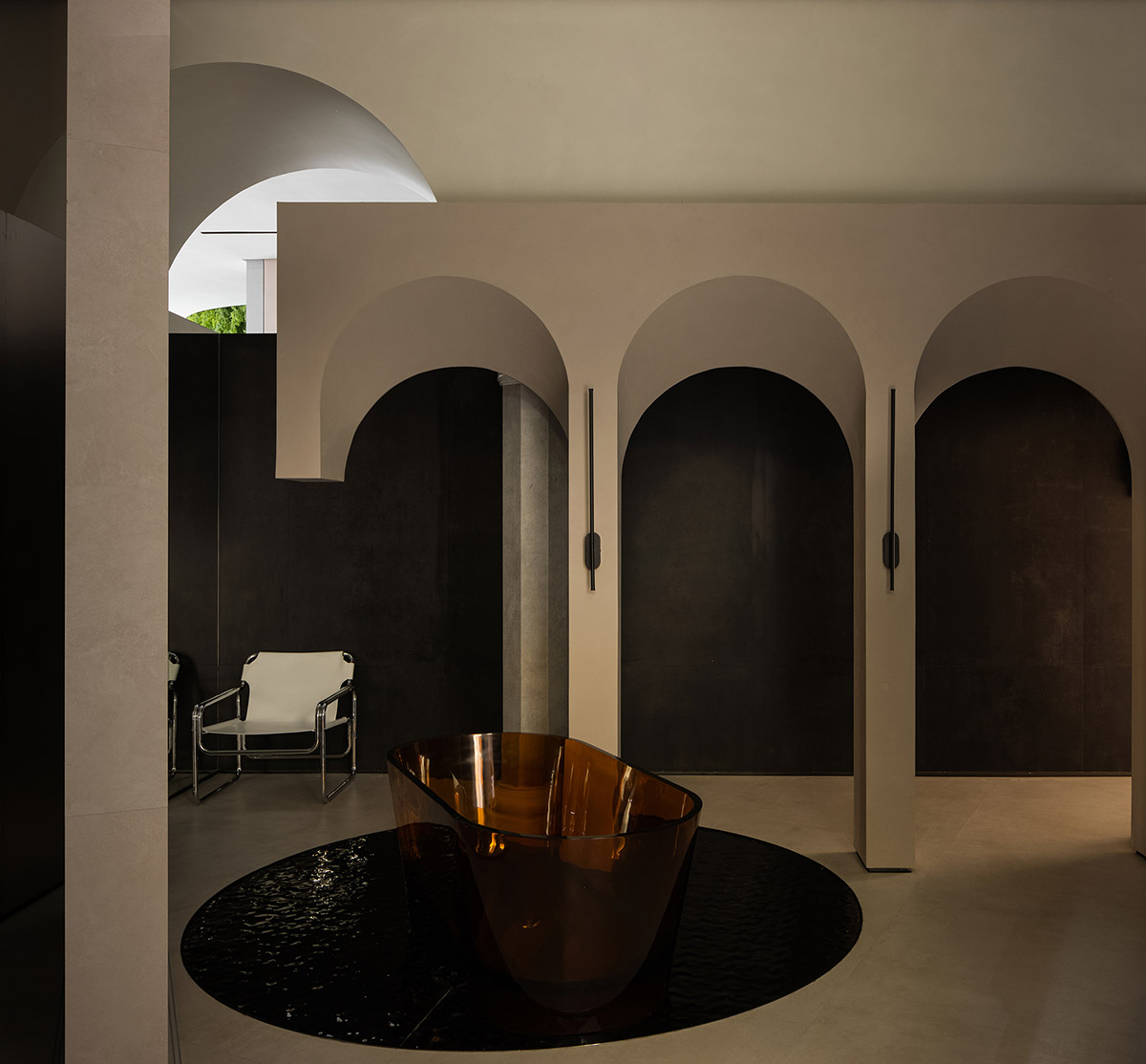 Curved walls and cave-like holes form I.T CERAMICHE Headquarters by Foshan Topway Design