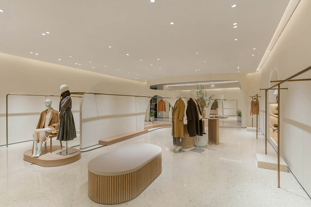 JYDP designs retail space with warm tones and curved walls in Shanghai