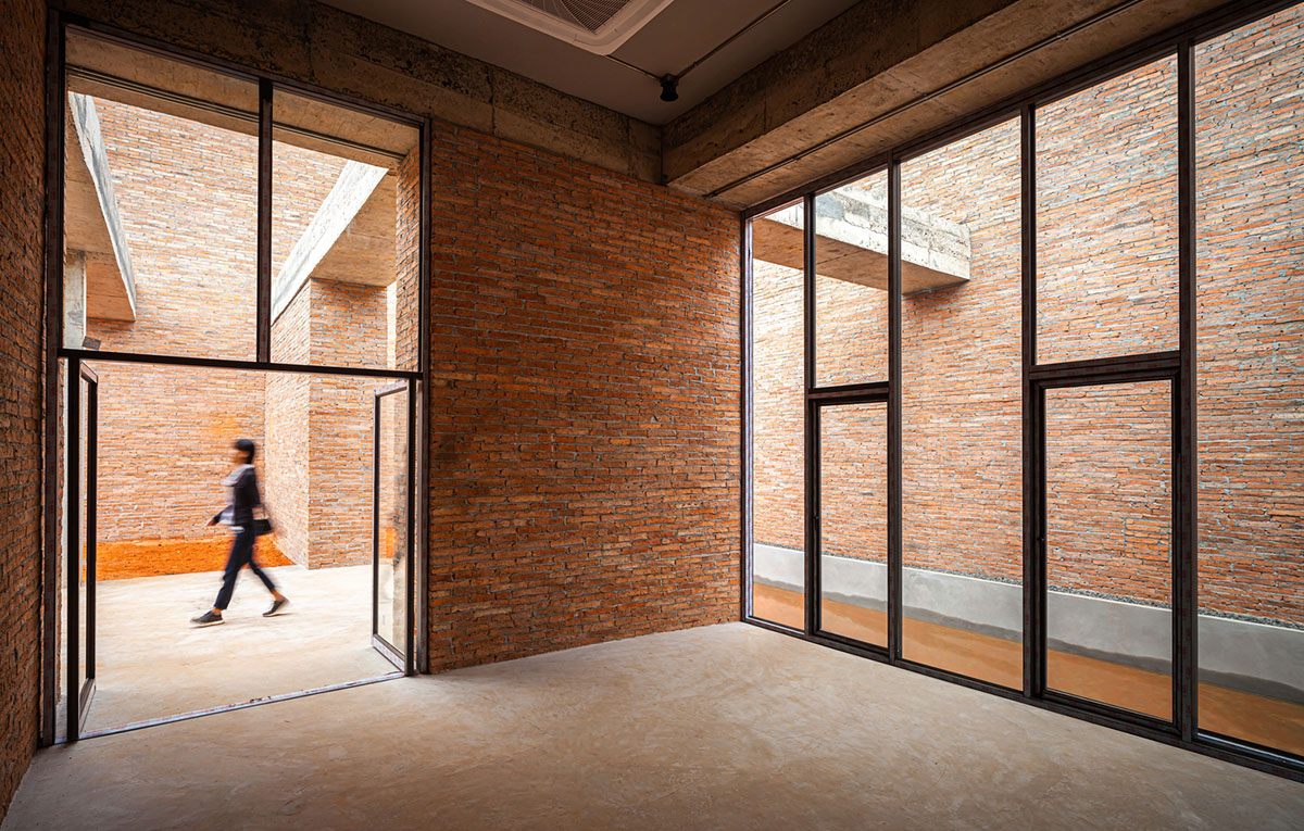 Bangkok Project Studio used over 480,0000 fired clay bricks to form elephant museum with curved walls