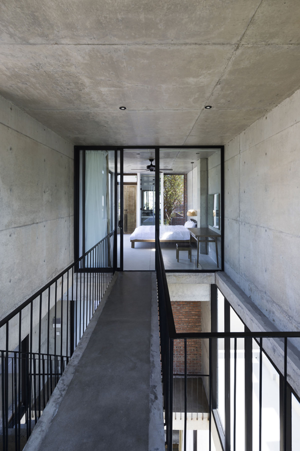 Ho Khue Architects' concrete house is inspired by imaginations of ...