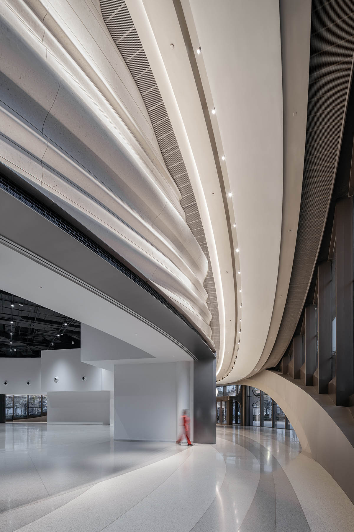 Undulating lines and expansive waves define interior of