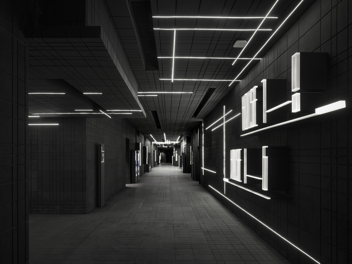 One Plus Partnership enhances depth of interior space with blue metal bars for a Cinema in Shenzhen