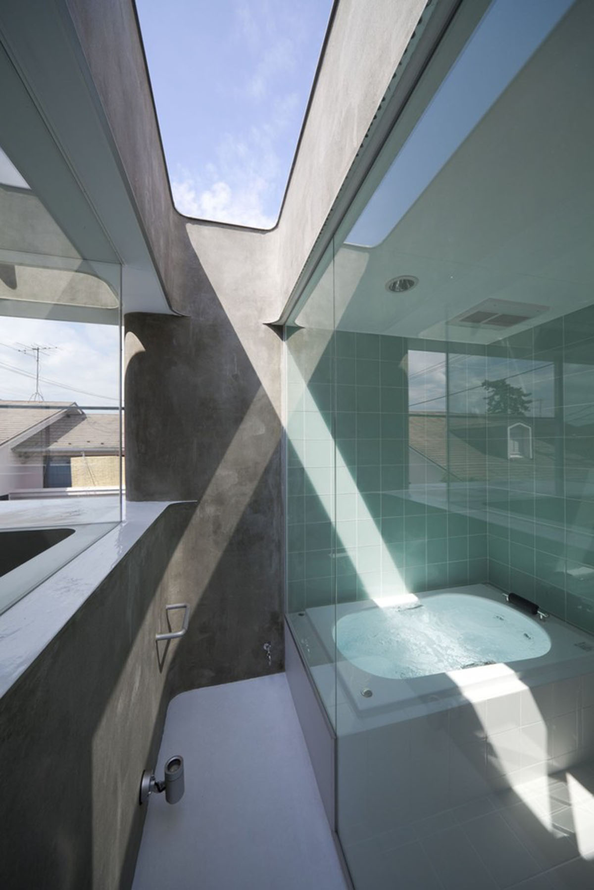 Casting moulds form this fluid private residence and dental clinic designed by N MAEDA ATELIER