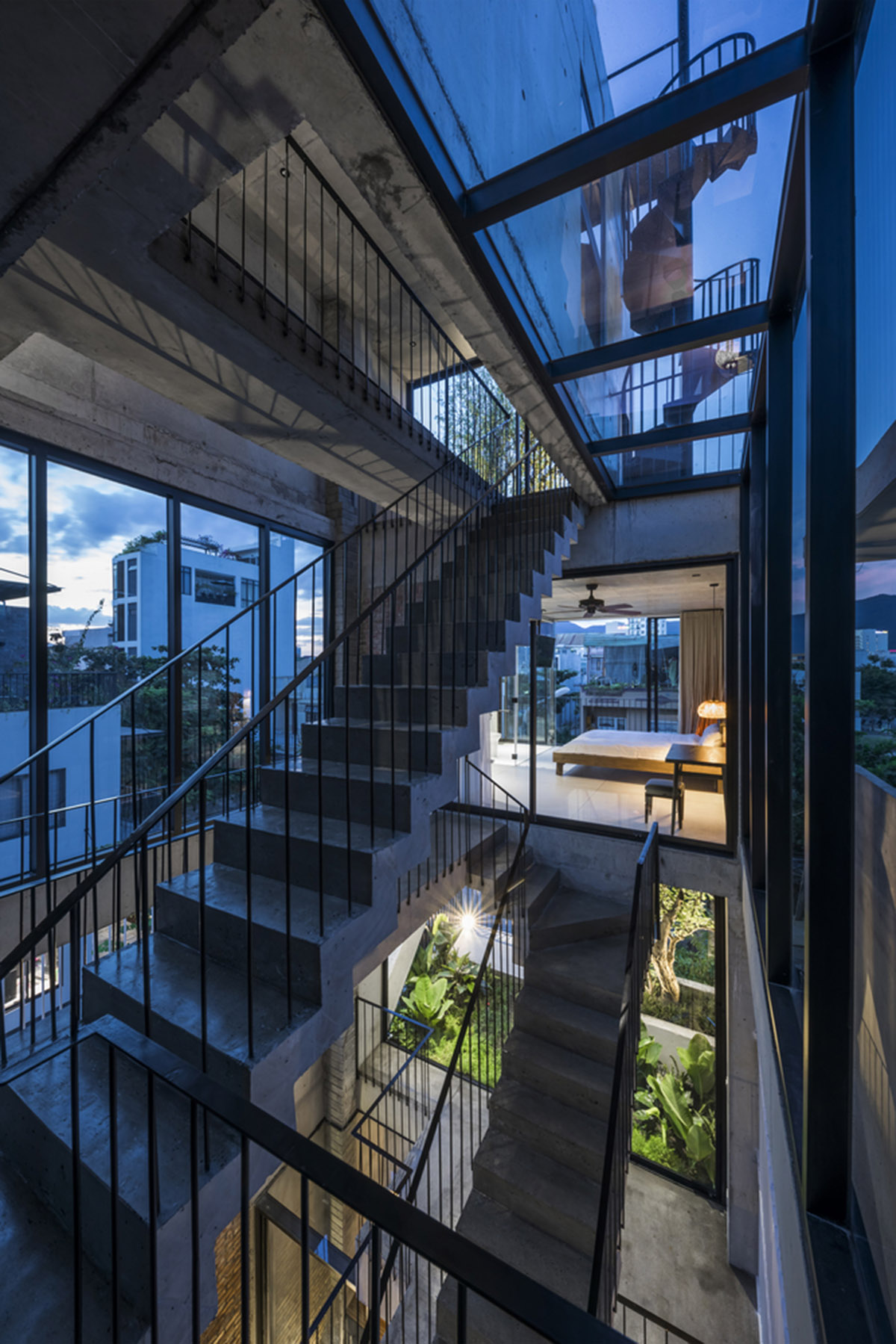 Ho Khue Architects' concrete house is inspired by imaginations of children’s LEGO game in Vietnam