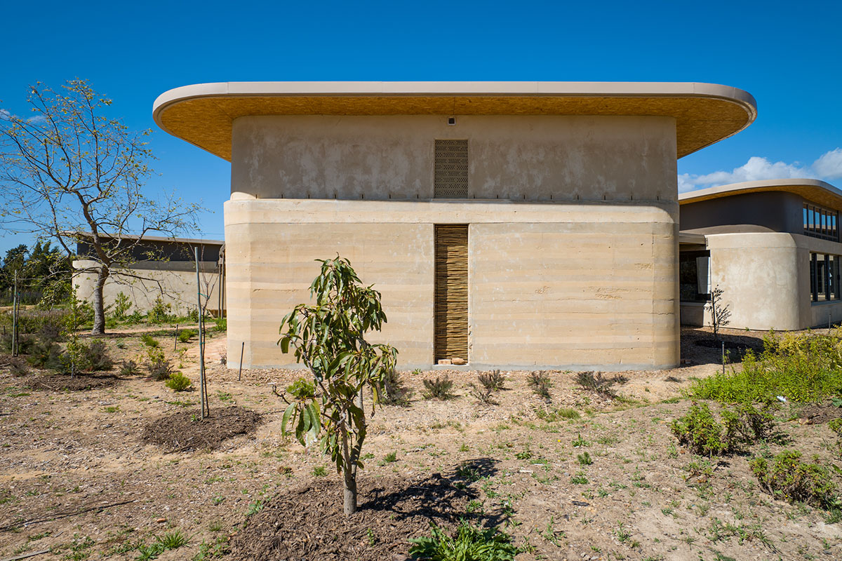GASS Architecture Studios built green school with rounded walls and leaf-like roofs in South Africa 