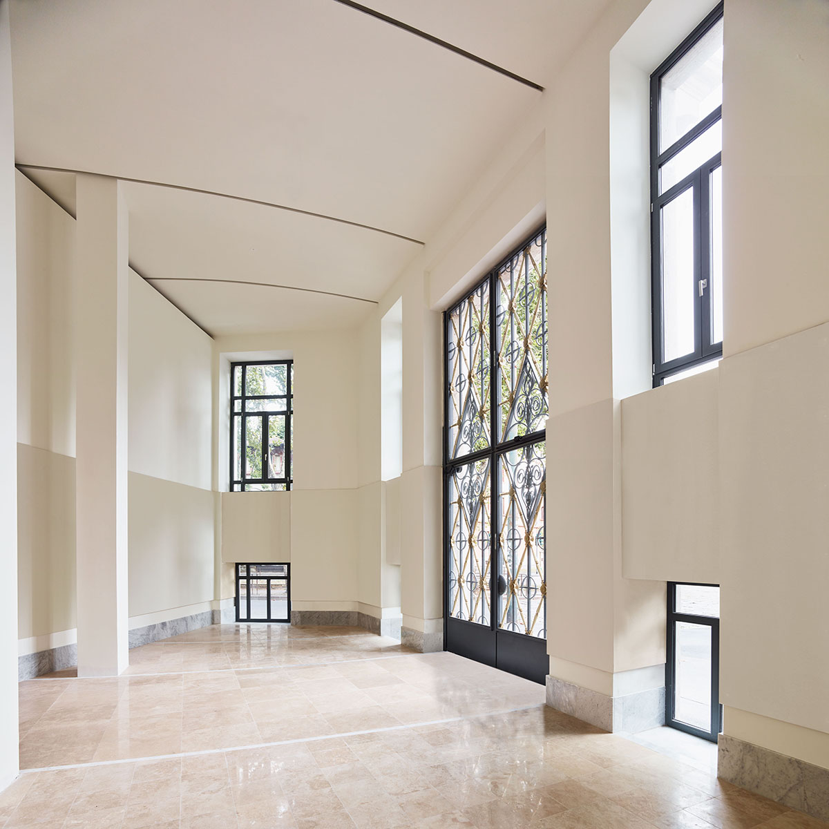 Eisenman Architects, Degli Esposti Architetti & AZstudio complete curved Residenze Carlo Erba