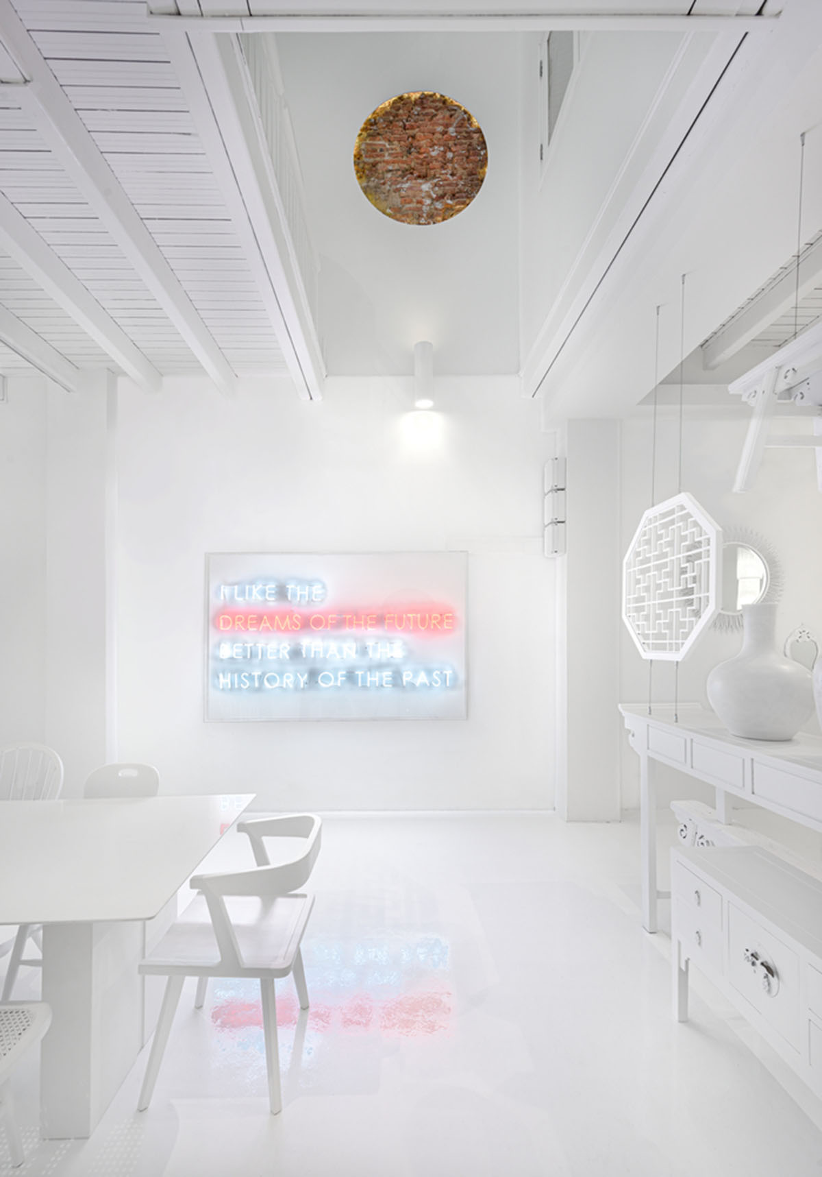 Ministry of Design transforms old dwelling in Singapore into co-living house with all-white interiors