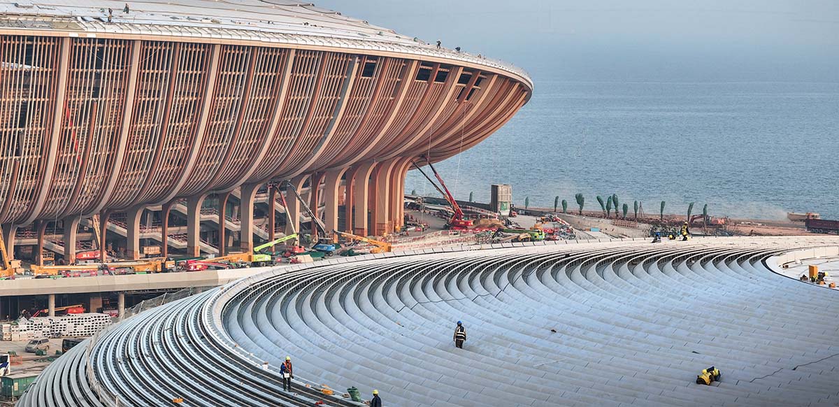 ZHA's Greater Bay Area Sports Centre, featuring distinctive layered roof, nears completion in China