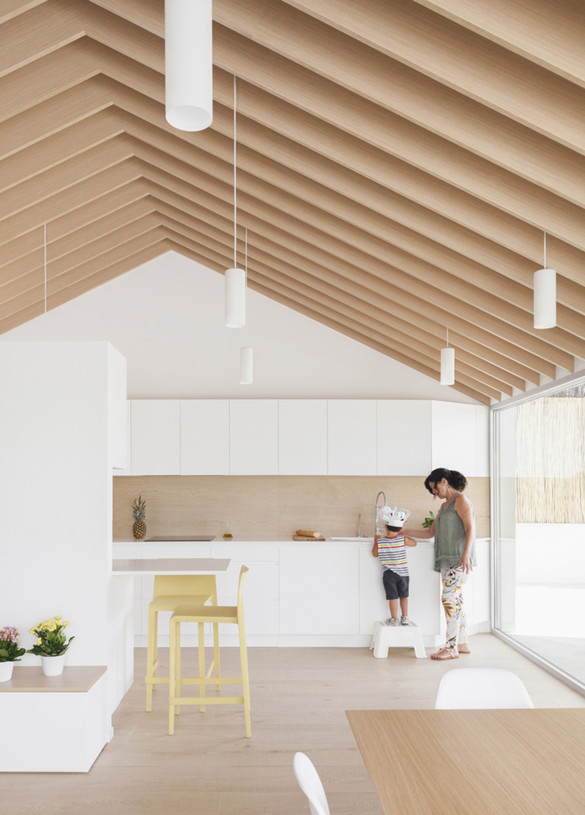 Pablo Muñoz Payá Arquitectos renovates former house with wooden shutters in Spain