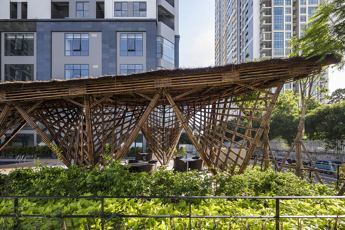 VTN Architects' Vinata Bamboo Pavilion creates a natural pathway in a garden of high-rise buildings