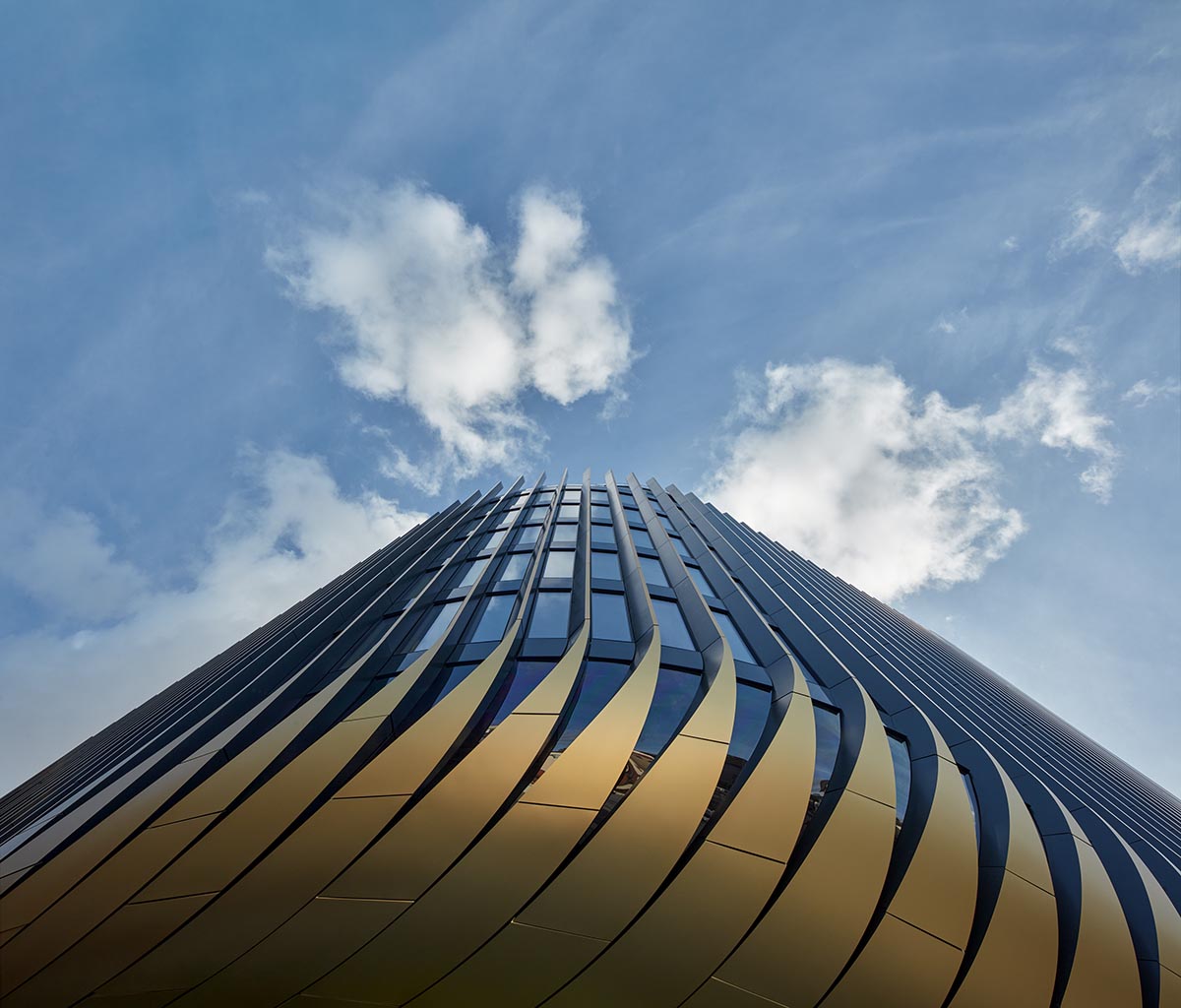 Zaha Hadid Architects completes Masaryčka building with golden vertical fins in Prague