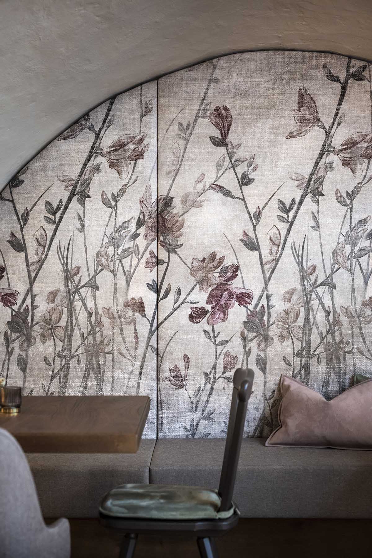 noa* transforms 19th-century workshop house into bohemian-style bistro with deep alcoves in Italy