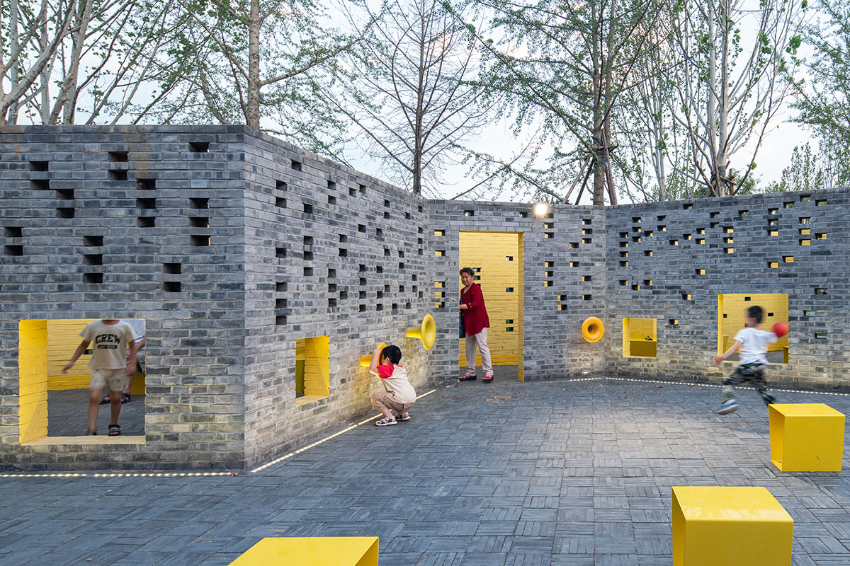 Crossboundaries designs community park with perforated grey