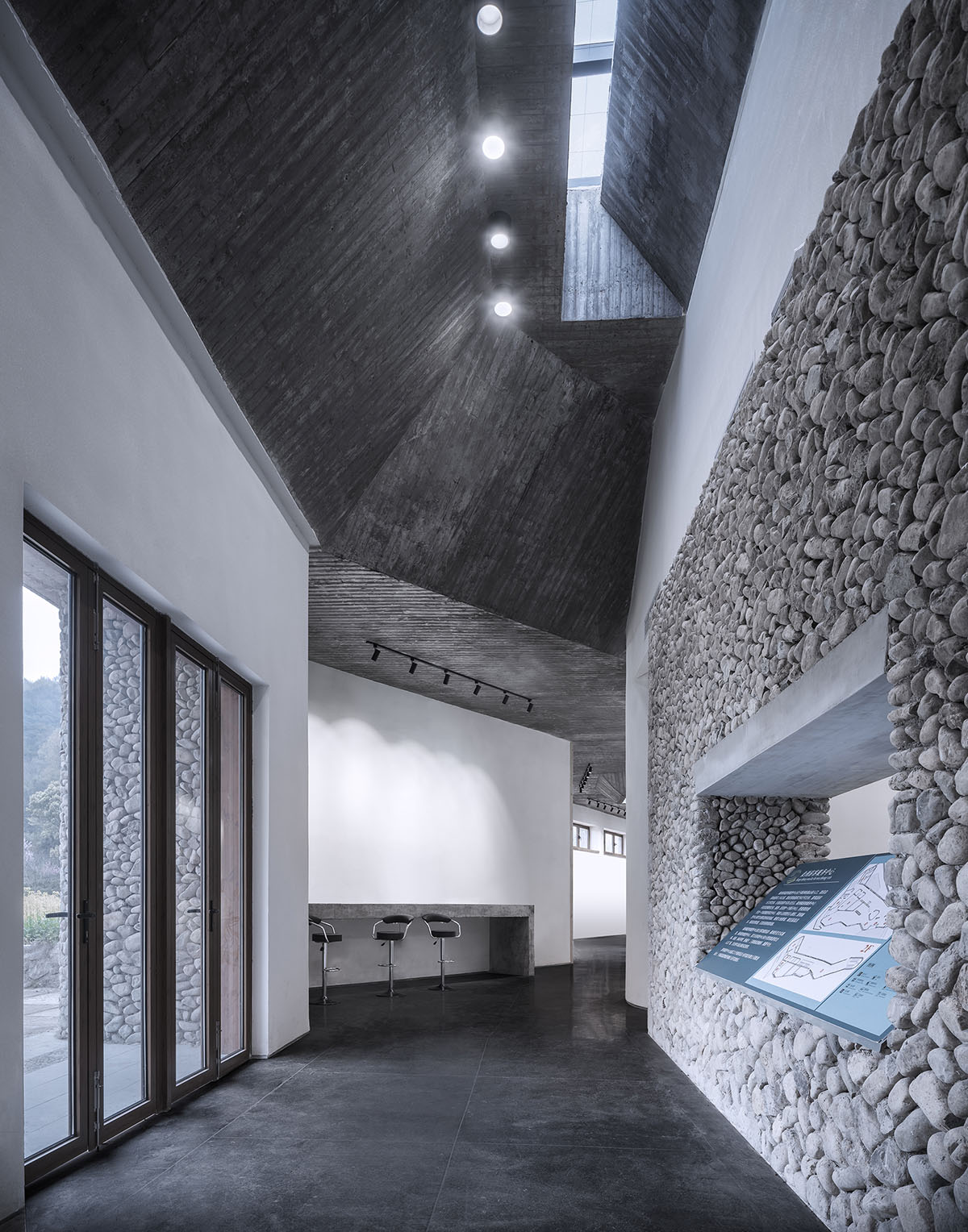 UAD built culture and history museum with terraced stone walls mimicking the site's landform 