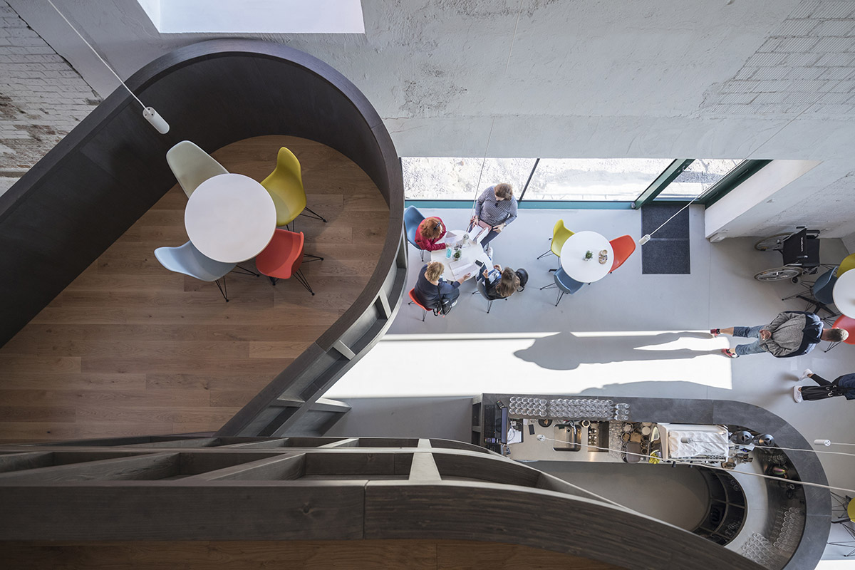 CHYBIK + KRISTOF converts historic brewery into House of Wine with rounded black volumes in Znojmo