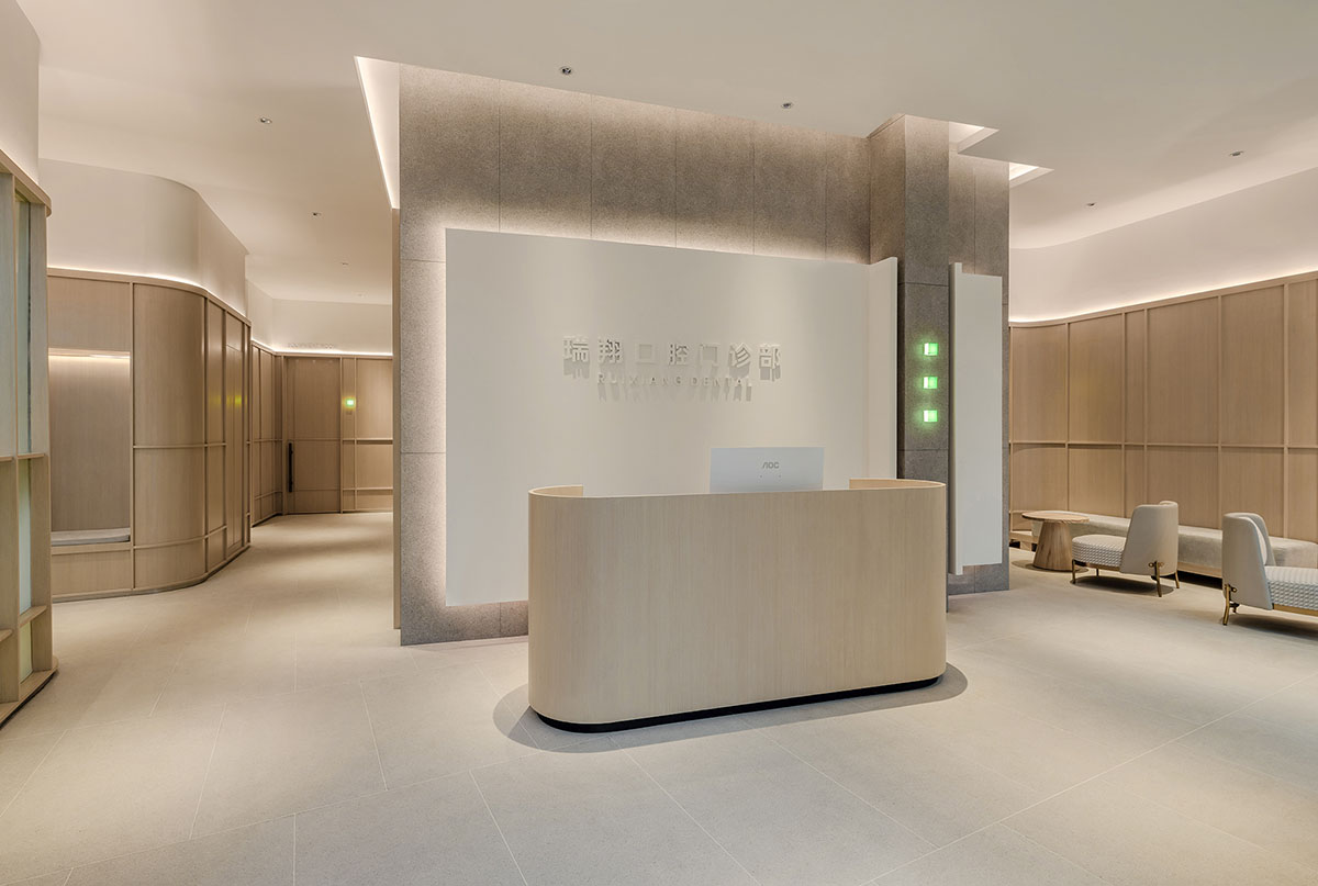 JACKY.W DESIGN completes dental clinic with rounded wooden walls and ...